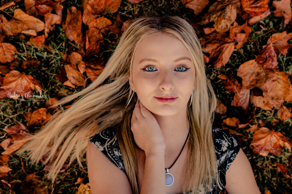 Senior girl in fall foilage in East Cobb