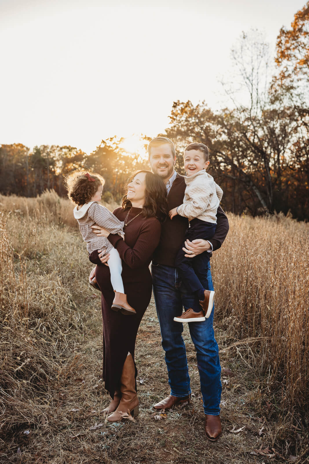 Family portrait in a field at sunset in Marietta, GA