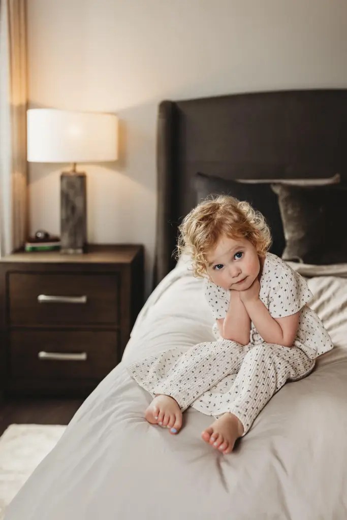 Toddler sibling at newborn photo session in Roswell, GA
