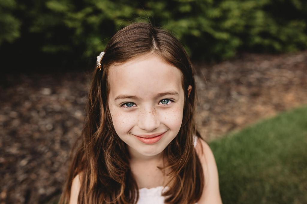 Smiling portrait of family in Roswell Ga