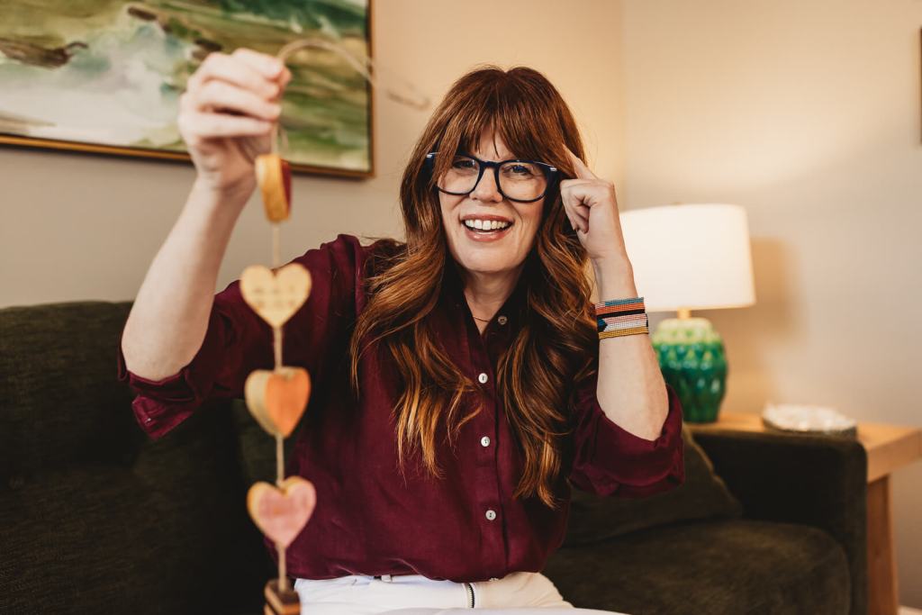Business owner laughing during relaxed branding session