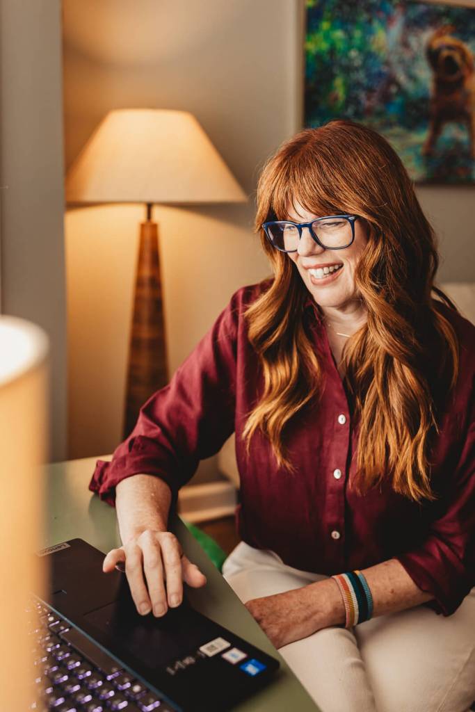 Personal branding photographer documenting authentic work moments