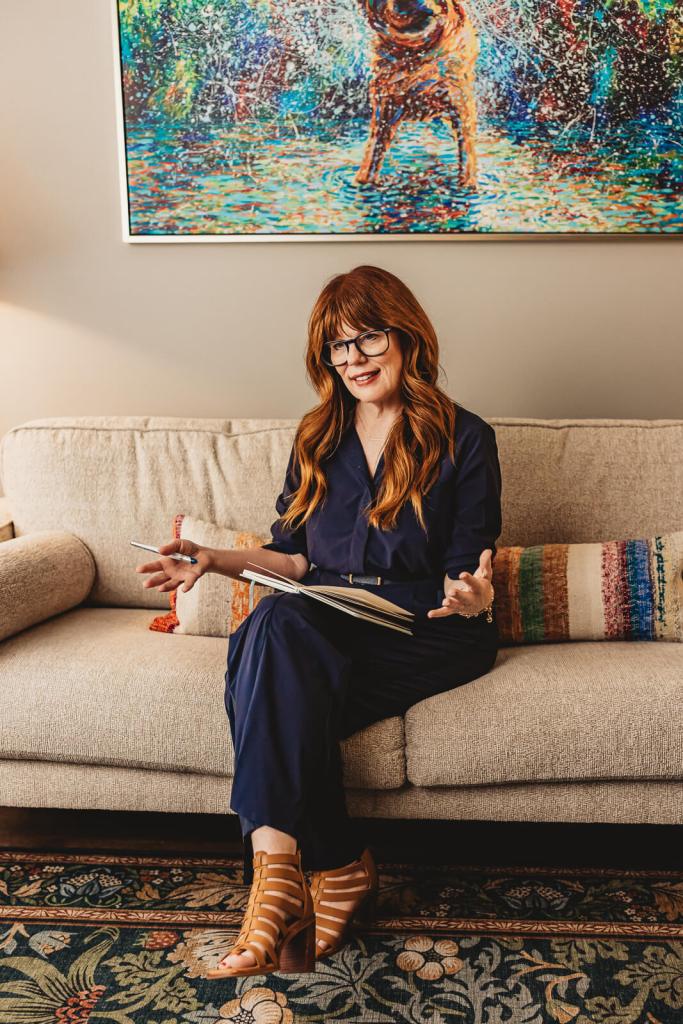 Personal branding photographer documenting authentic work moments