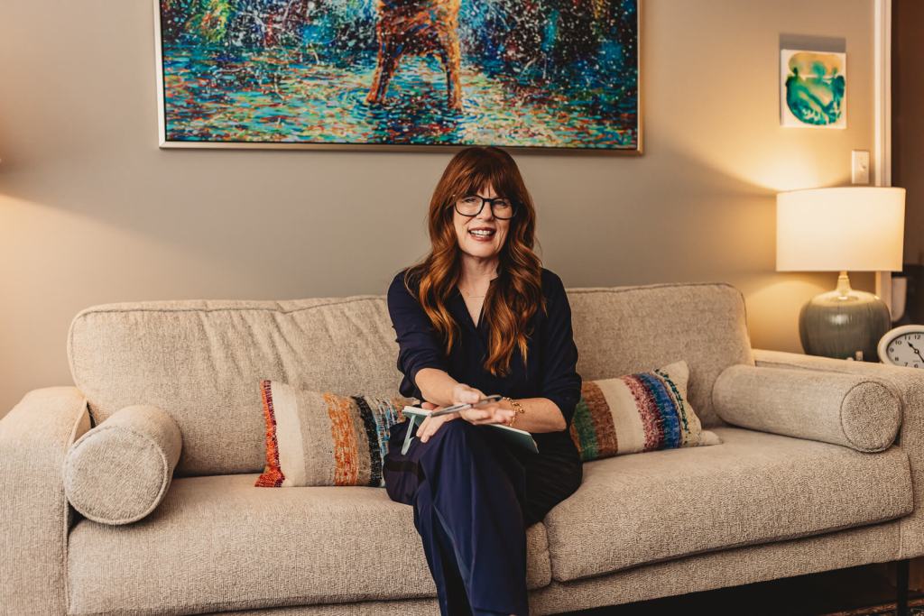 Business owner smiling during personal branding photography session