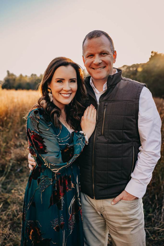 Couple smiling at a family photo session in Marietta.