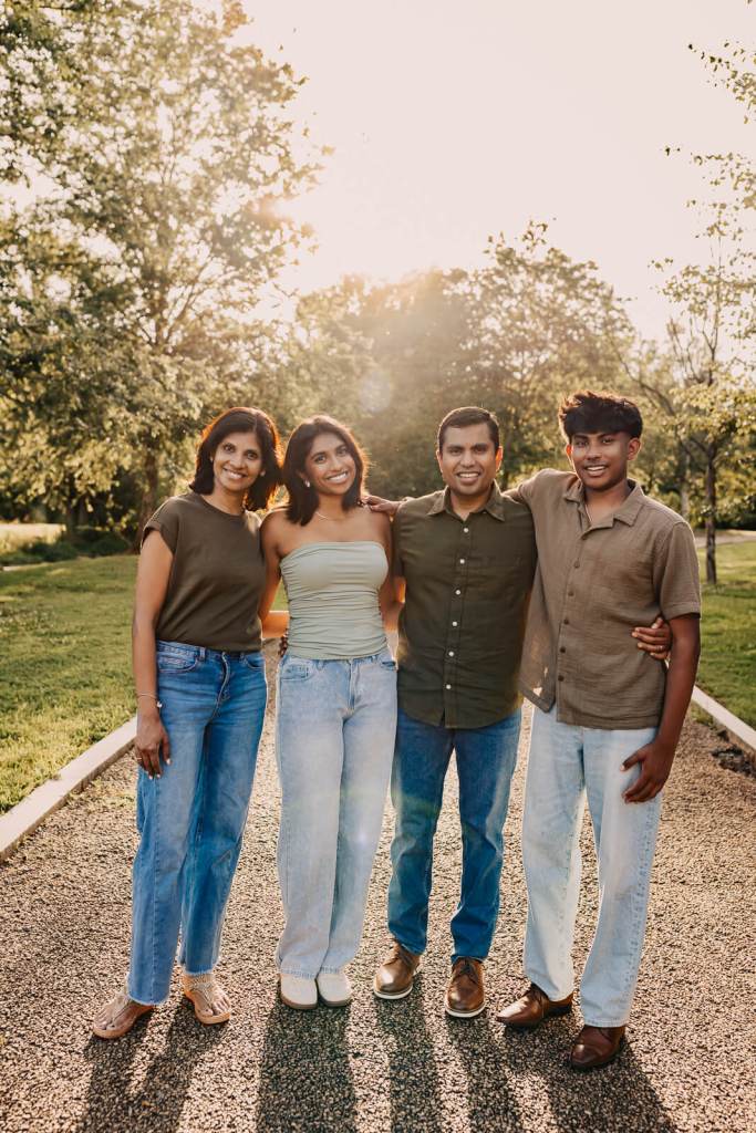 Family laughing together during a natural family photography session in Marietta, Georgia