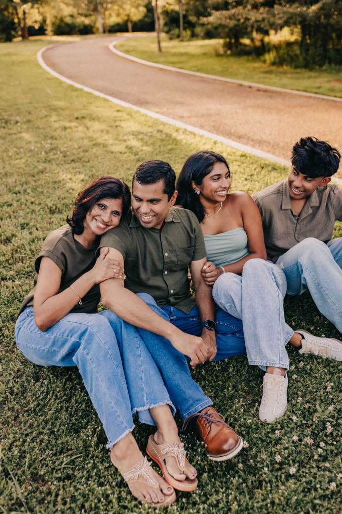 Candid family laughing together during a natural family photography session in Roswell, Georgia